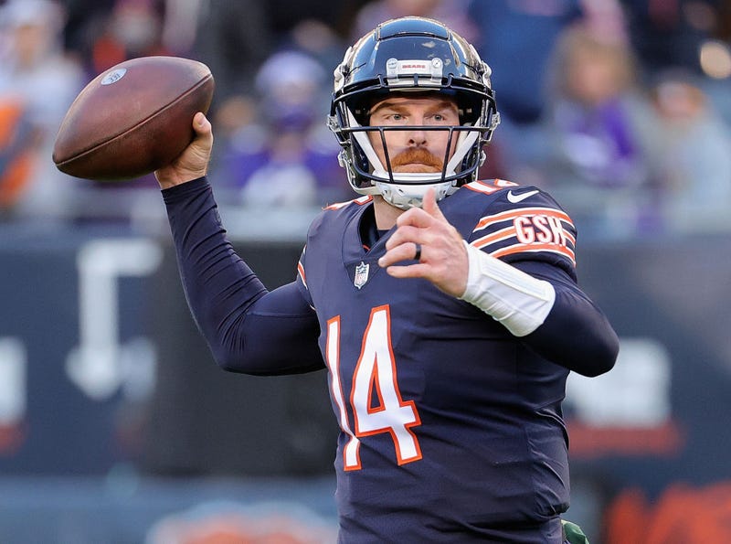 Andy Dalton #14 of the Chicago Bears passes in the 4th quarter against the Baltimore Ravens at Soldier Field on November 21, 2021 in Chicago, Illinois. The Ravens defeated the Bears 16-13.