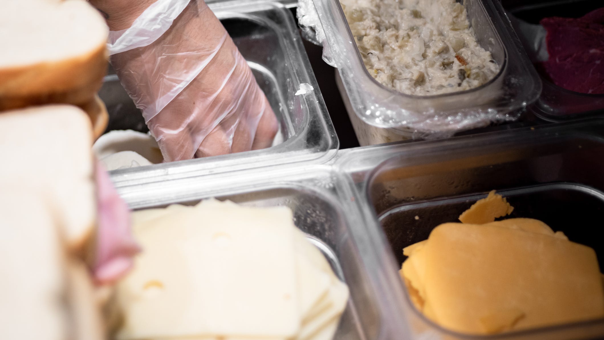 Worker hurls sandwich at customer, who pushed it on the floor because it was made wrong