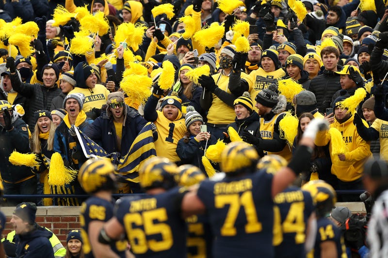 Michigan football players and fans