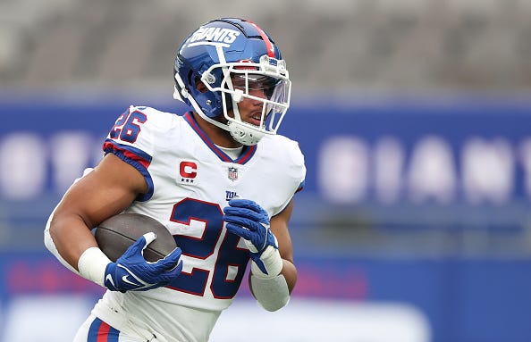 Saquon Barkley models the Giants "Color Rush" uniforms. 