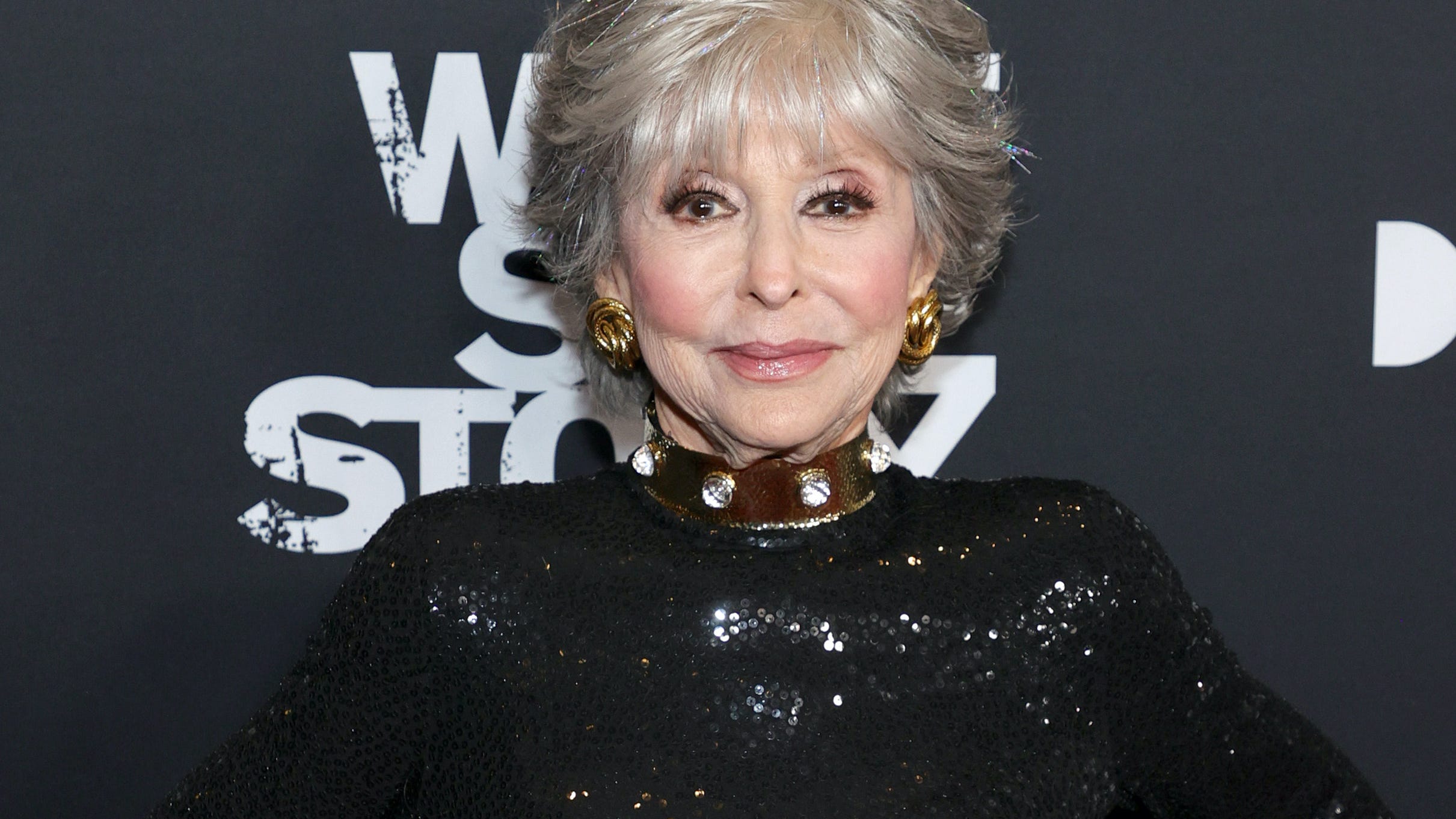 Rita Moreno, 90, puts her legs on display in black stockings and heels in age-defying photos
