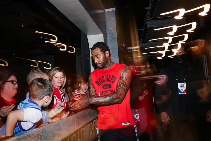 John Wall #1 of the Houston Rockets signs for fans prior to the Houston Rockets facing the Oklahoma City Thunder at Toyota Center on November 29, 2021 in Houston, Texas.
