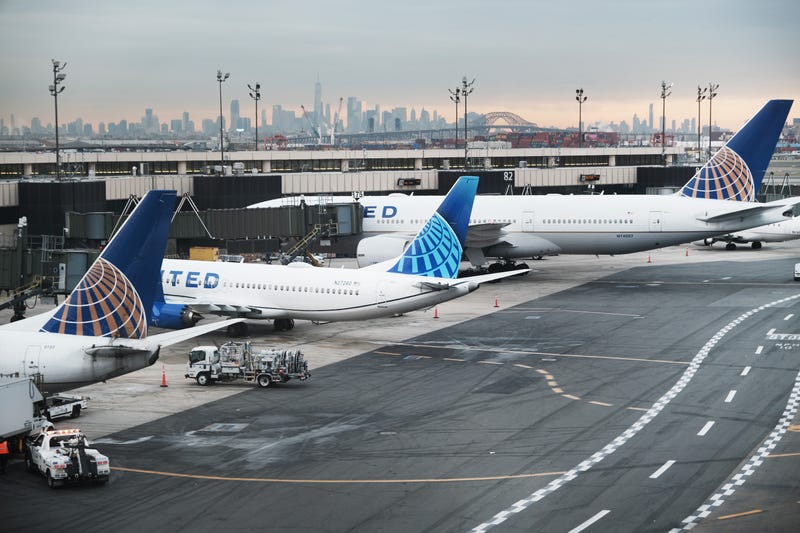 Airplanes on the runway at Newark Liberty International Airport.