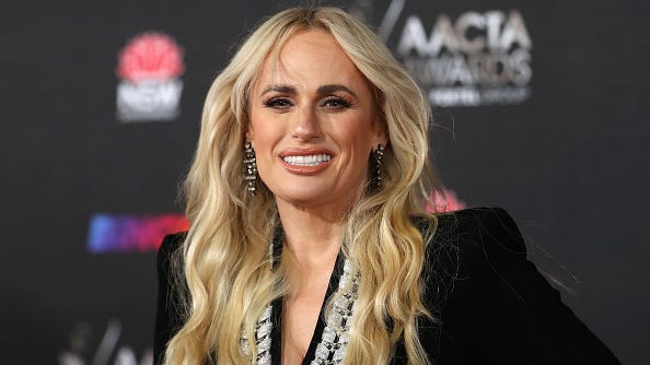 Rebel Wilson, 41, shows off her toned legs in black minidress: ‘Feeling very contemplative’