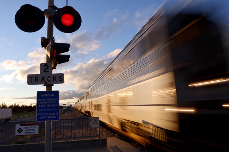 Amtrak train passing through crossing