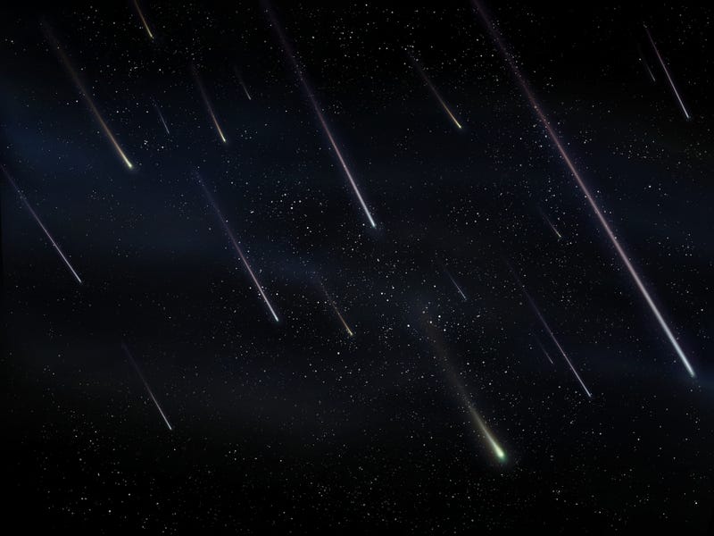 Meteor shower in the night sky. 
