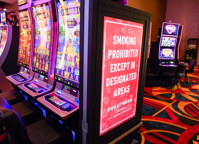A sign on the end of a row of slot machines reads "Smoking Prohibited Excepts in Designated Areas" at the Hollywood Casino Morgantown, Dec. 17, 2021, Morgantown, Pennsylvania.