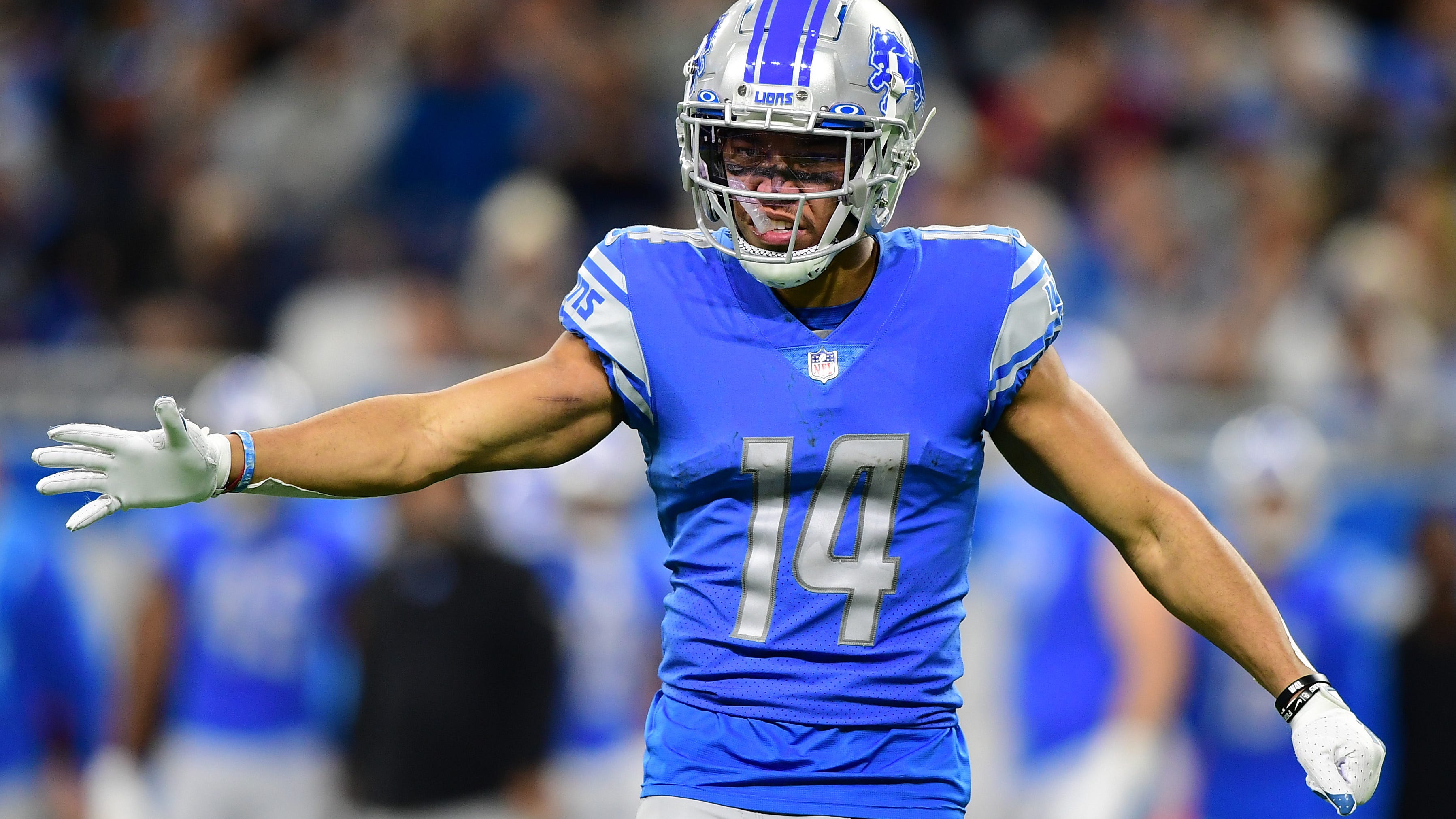Lions' banged up roster takes another hit as Amon-Ra St. Brown suffers concussion, ruled out