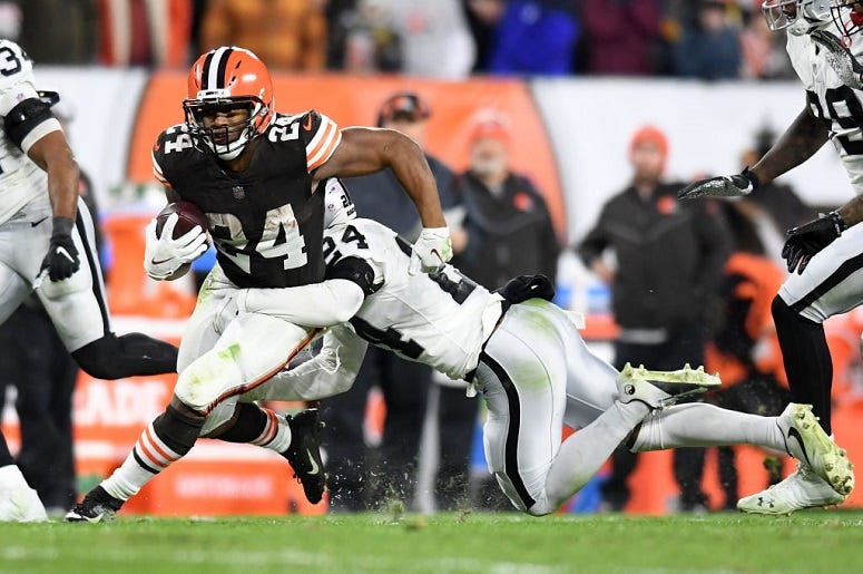Nick Chubb #24 of the Cleveland Browns is tackled by Johnathan Abram #24 of the Las Vegas Raiders