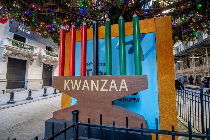 A Kwanzaa Kinara stands in front of The New York Stock Exchange on the corner of Broad St. and Wall St. on December 20, 2021 in New York City.