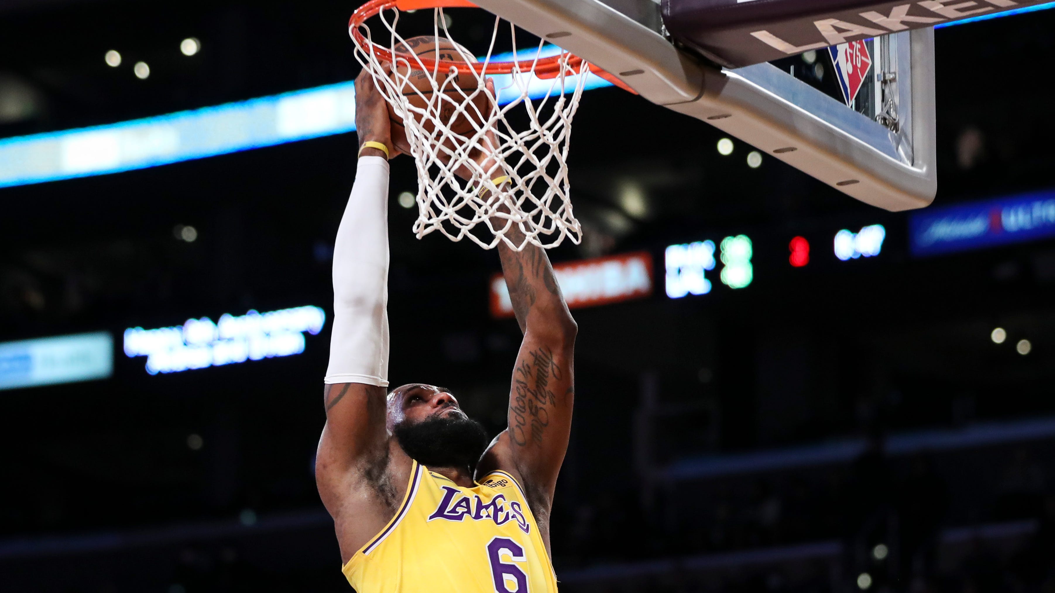 LeBron arrived to Tuesday night’s game with Crocs and a cigar in hand