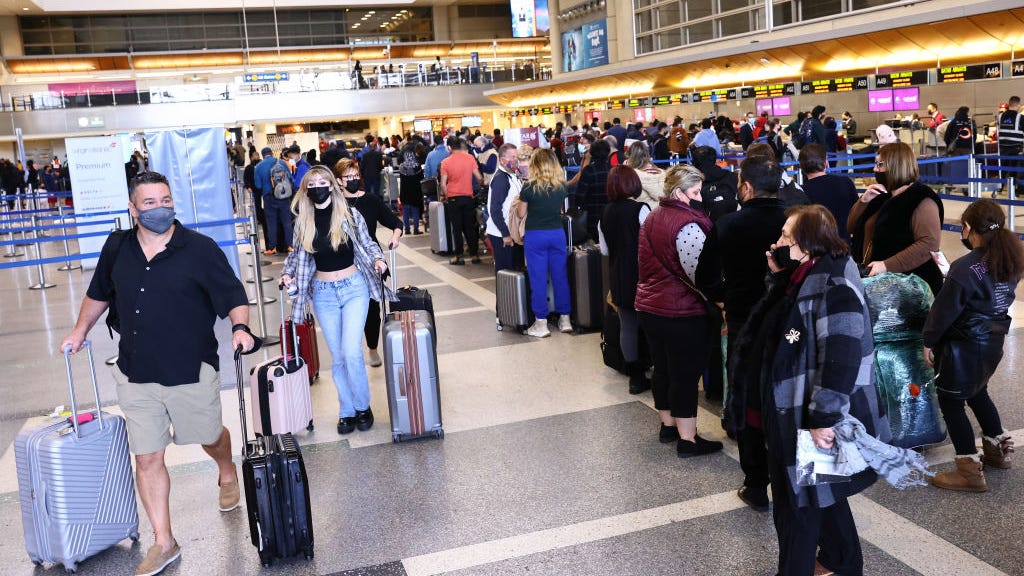 Airlines continue to cancel flights as workforce strains under spread of Omicron