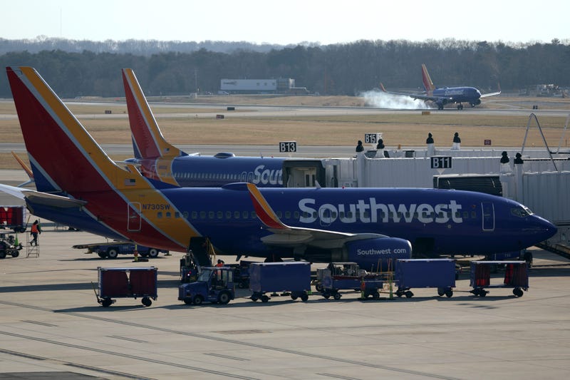 BALTIMORE, MARYLAND - DECEMBER 22: Southwest Airlines aircrafts are seen at Baltimore/Washington International Thurgood Marshall Airport (BWI) on December 22, 2021 in Baltimore, Maryland. AAA predicted more than 109 million Americans will travel 50 miles or more over Christmas and New Year holidays, a spike of 27.7% over last year. 
