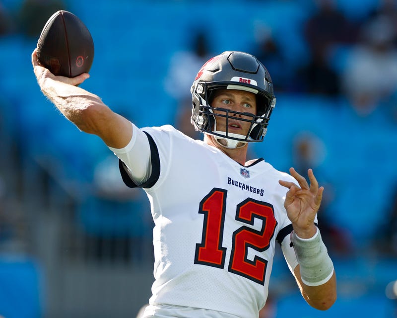 Tom Brady #12 of the Tampa Bay Buccaneers warms up before the game against the Carolina Panthers at Bank of America Stadium on December 26, 2021 in Charlotte, North Carolina