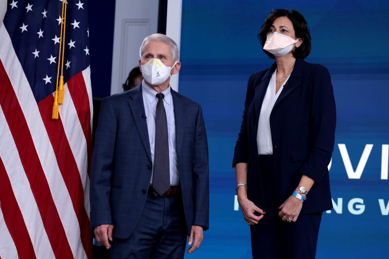 Dr. Anthony Fauci, Director of the National Institute of Allergy and Infectious Diseases and the Chief Medical Advisor to the President, and Centers for Disease Control and Prevention Director Rochelle Walensky, arrive for a video call with U.S. President Joe Biden, the White House Covid-19 Response team and the National Governors Association in the South Court Auditorium at the Eisenhower Executive Office Building on December 27, 2021 in Washington, DC.