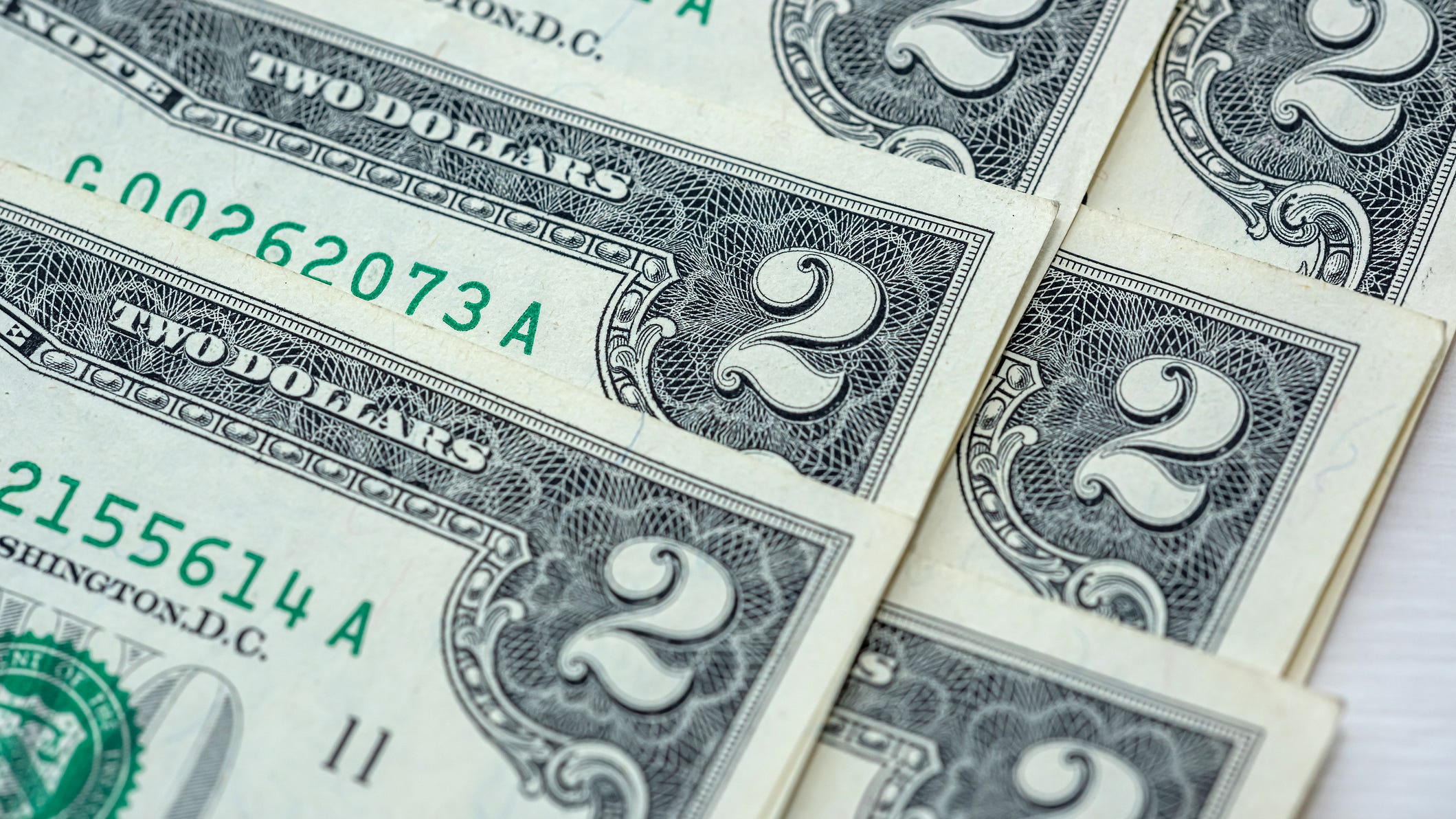 Money or happiness? The $2 bill buys both