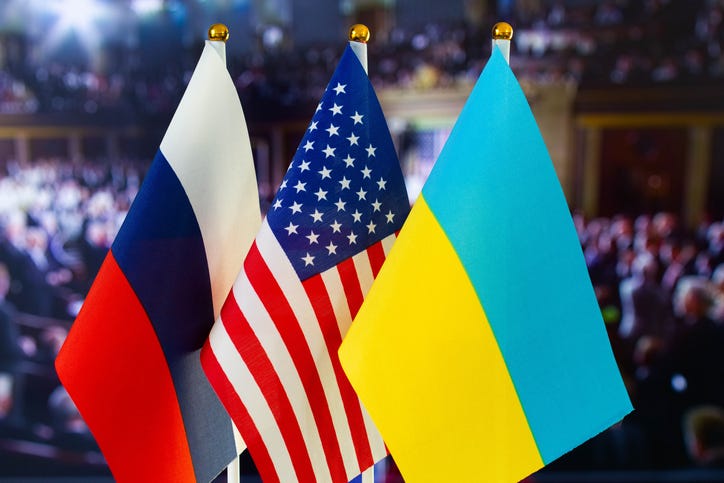 Flags of the U.S., Russia and Ukraine are displayed.