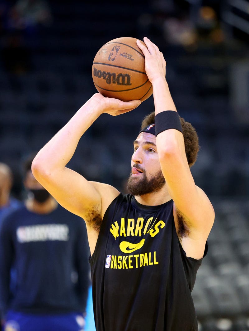 Injured Klay Thompson #11 of the Golden State Warriors shoots around before their game against the Miami Heat at Chase Center on January 03, 2022 in San Francisco, California.
