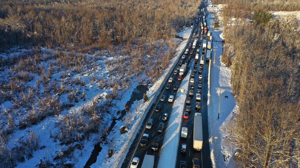 Man stuck overnight on snowy freeway gets $600 Uber bill