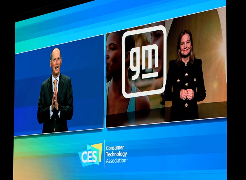 President and CEO of the Consumer Technology Association Gary Shapiro (L) is shown on screen as he livestreams with General Motors Chair and CEO Mary Barra before her keynote address was delivered digitally at CES 2022