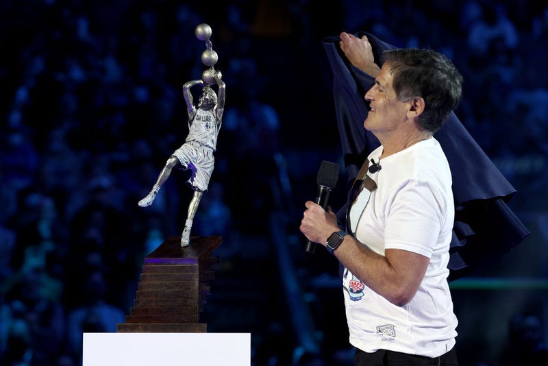 eam owner Mark Cuban unveils a replica statue of former player Dirk Nowitzki during a ceremony honoring Nowitzki's career and retiring his No. 41 jersey at American Airlines Center on January 05, 2022 in Dallas, Texas.