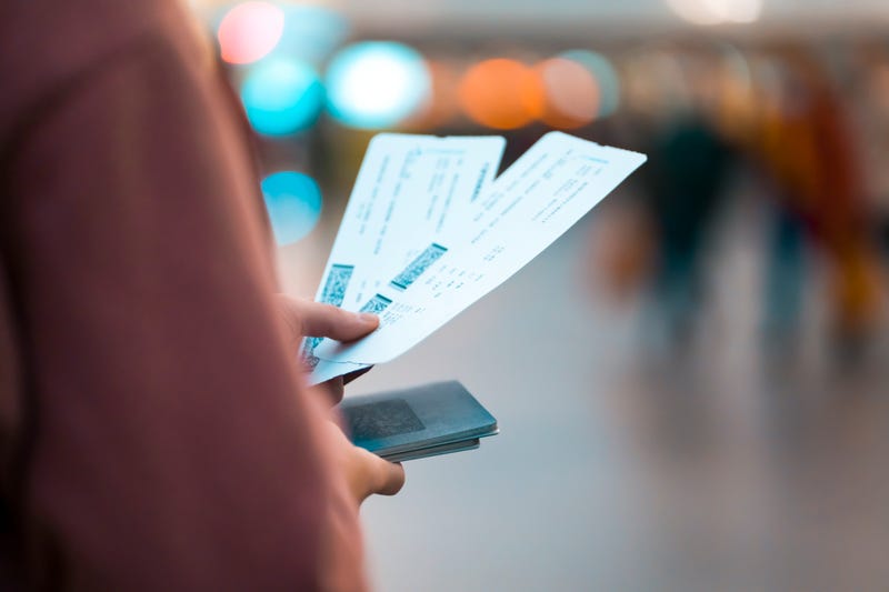 person holding tickets