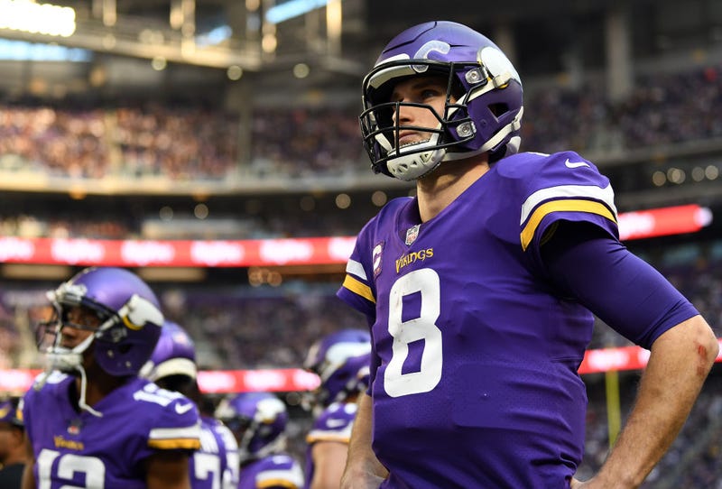 Kirk Cousins #8 of the Minnesota Vikings looks on from the sidelines during the game against the Chicago Bears at U.S. Bank Stadium on January 09, 2022 in Minneapolis, Minnesota.