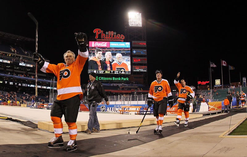 Flyers defenseman Joe Watson leaves the ice with his teammates after playing against the New York Rangers during the 2012 Bridgestone NHL Winter Classic Alumni Game on December 31, 2011 at Citizens Bank Park.