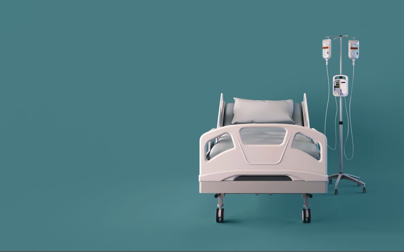 An empty hospital bed. 