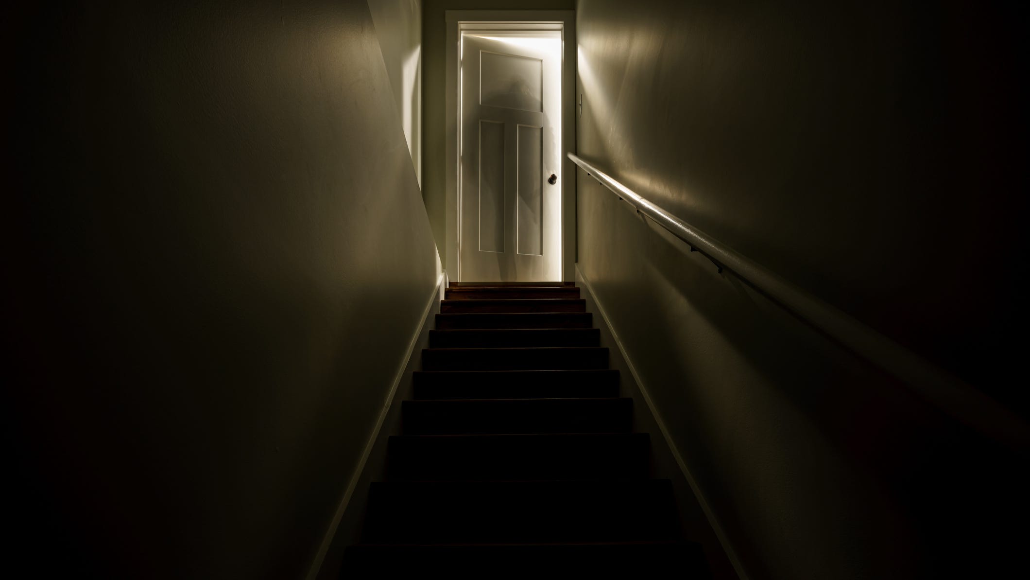 Man lived with dead roommate's body for four years, cashing his checks