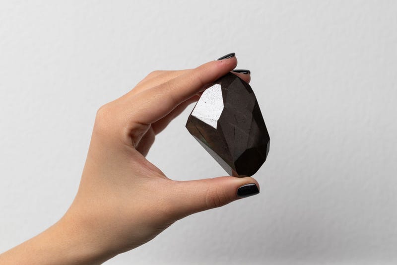 The Largest Faceted Diamond to ever come to Auction, The Enigma, at 555.55 carats is unveiled at Sotheby's Dubai, on January 17, 2022 in Dubai, United Arab Emirates. (Photo by Neville Hopwood/Getty Images for Sotheby's Dubai)
