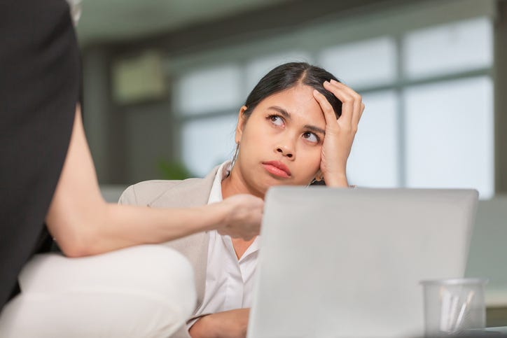 Frustrated woman at work