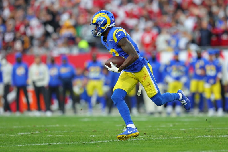 Van Jefferson #12 of the Los Angeles Rams runs with the ball in the fourth quarter of the game against the Tampa Bay Buccaneers in the NFC Divisional Playoff game at Raymond James Stadium on January 23, 2022 in Tampa, Florida.