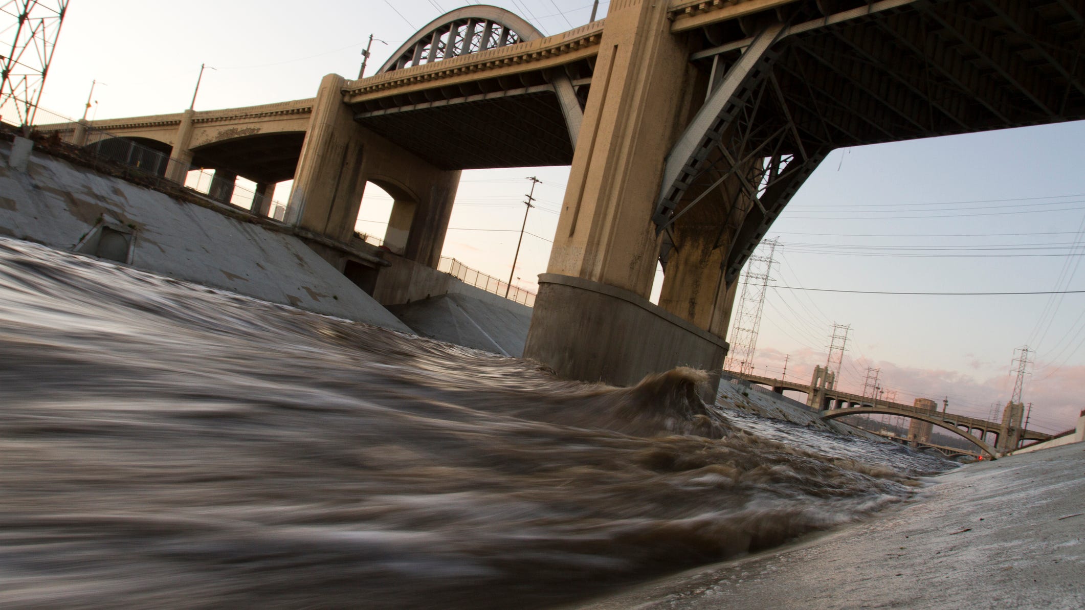 Car found in L.A. River following collision, rescue crews searching for missing driver