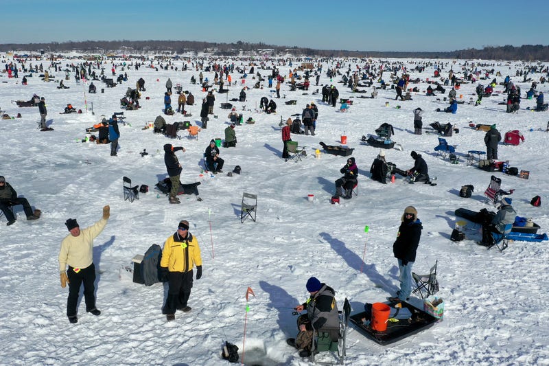 Fishermen compete in the Brainerd Jaycees Ice Fishing Extravaganza on January 29, 2022 in Brainerd, Minnesota. About 10,000 anglers were expected to compete in the tournament, which is billed as the "largest charitable ice fishing contest in the world". 