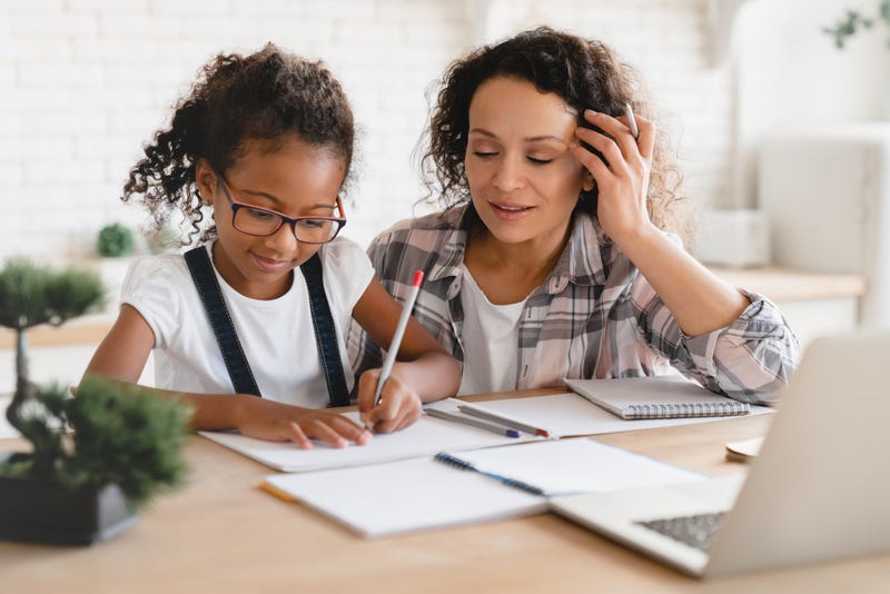 Tutor working with a student. 