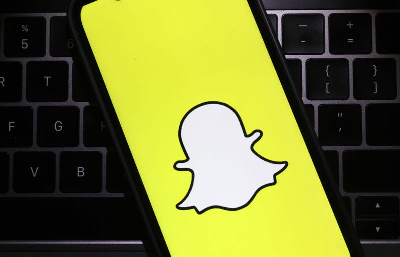 In this photo illustration, the Snapchat logo is displayed on a cell phone screen on February 03, 2022 in San Anselmo, California. 