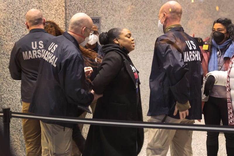 Demonstrators, protesting the release from prison of former Chicago police officer Jason Van Dyke, are taken into custody by U.S. Marshals inside of the federal courthouse on February 03, 2022 in Chicago, Illinois. Van Dyke served a little more than three years after being convicted of murder in the 2014 shooting death of Laquan McDonald.