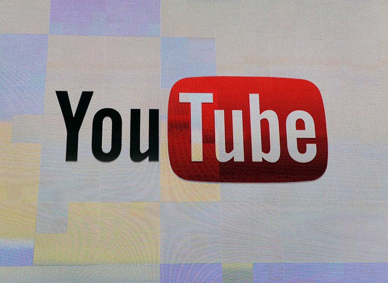 The YouTube logo appears on screen before a keynote address by Vice President of Global Content Partnerships at YouTube Robert Kyncl at the 2012 International Consumer Electronics Show at the Las Vegas Hotel & Casino January 12, 2012 in Las Vegas, Nevada.