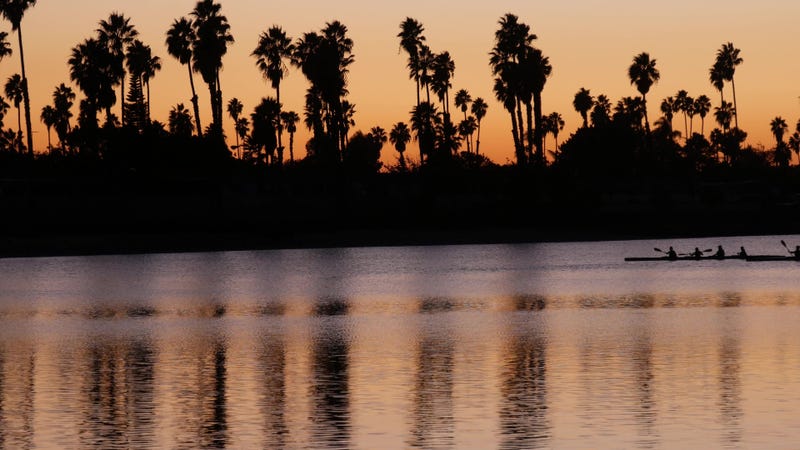 Reflection of purple-pink, orange sky in the waters of Mission Bay, San Diego.
