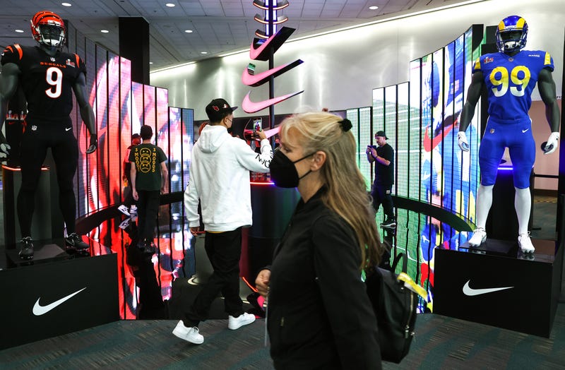 People gather in front of the NFL Shop at the Los Angeles Convention Center on February 7, 2022 in Los Angeles, California.