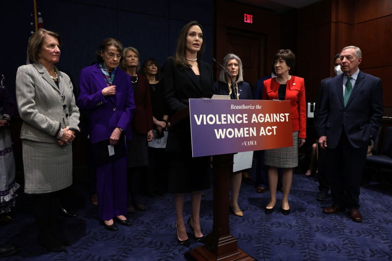 Actress Angelina Jolie speaks as (L-R) U.S. Sen. Shelley Moore Capito (R-WV), Sen. Dianne Feinstein (D-CA), Sen. Lisa Murkowski (R-AK), National Coalition Against Domestic Violence President Ruth Glenn, Sen. Joni Ernst (R-IA), Sen. Susan Collins (R-ME) and Senate Majority Whip Sen. Richard Durbin (D-IL) listen during a news conference at the U.S. Capitol February 9, 2022 in Washington, DC. A group of bipartisan U.S. senators held a news conference to announce a bipartisan modernized Violence Against Women Act (VAWA). (Photo by Alex Wong/Getty Images)