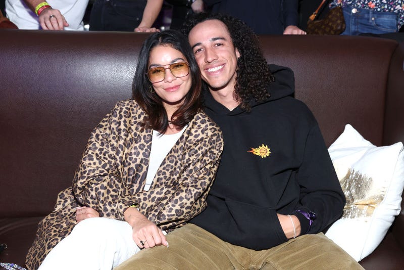 Vanessa Hudgens and Cole Tucker attend as John Mayer performs