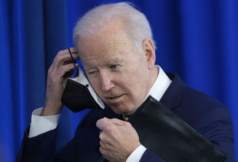 U.S. President Joe Biden puts on his mask after speaking during an event at Germanna Community College February 10, 2022 in Culpeper. Virginia. During his remarks, Biden highlighted the work his administration has done on lowering health care costs and prescription drug prices. (Photo by Win McNamee/Getty Images)