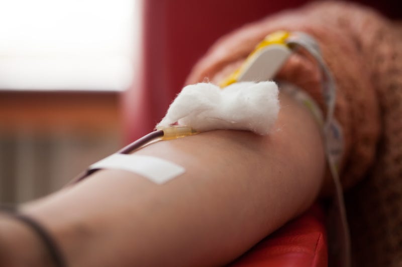 A person giving blood.
