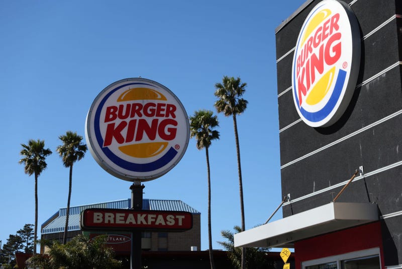 A sign is posted in front of a Burger King restaurant on February 15, 2022 in Daly City, California.