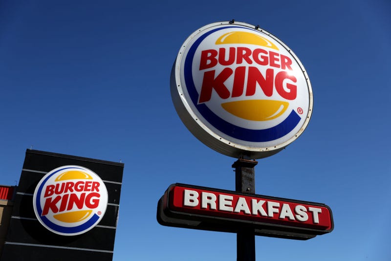 A sign is posted in front of a Burger King restaurant on February 15, 2022 in Daly City, California.