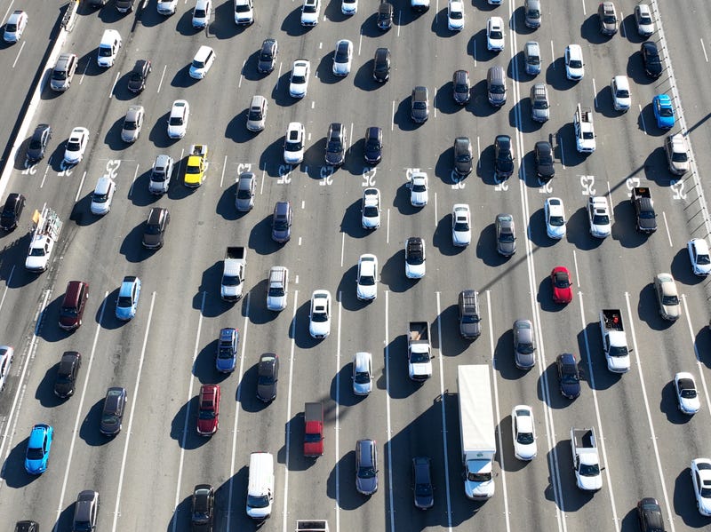  In an aerial view, traffic backs up at the San Francisco–Oakland Bay Bridge toll plaza on February 16, 2022 in Oakland, California. 