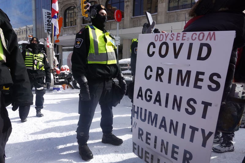 Police begin to break up a protest organized by truck drivers opposing vaccine mandates on February 18, 2022 in Ottawa, Ontario, Canada The drivers have used vehicles to form a blockade that has blocked several streets near Parliament Hill.