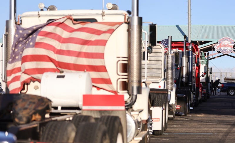 Truck drivers and supporters gather for a convoy to Washington, D.C.